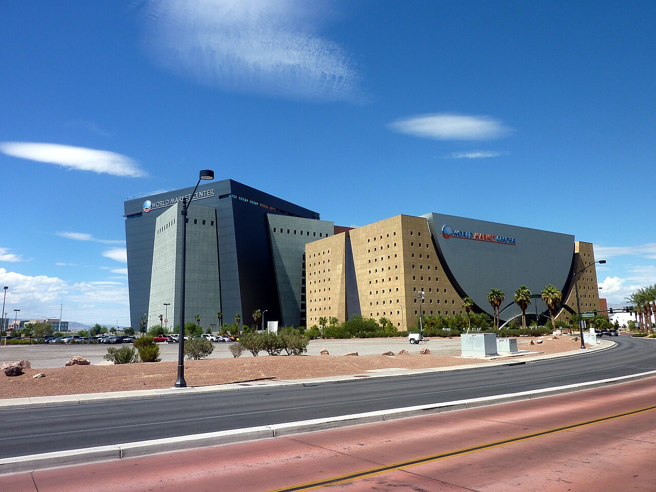 Two of the World Market Center buildings in Las Vegas under a blue sky